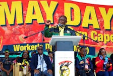 South Africa President Cyril Ramaphosa speaks at the Congress of South African Trade Unions (COSATU) National Worker's Day rally at Athlone Stadium in Cape Town, South Africa, May 1, 2024. REUTERS/Esa Alexander/File Photo