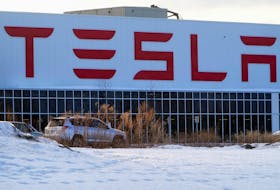 A Tesla sign is pictured outside the Tesla Gigafactory 2 in Buffalo, New York, U.S., February 13, 2022.