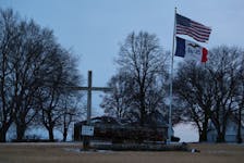 File photo: A cross and flags are seen near Ogden Adel, Iowa, U.S., January 16, 2020.