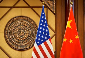 Flags of the U.S. and China sit in a room where U.S. Secretary of State Antony Blinken meets with China's Minister of Public Security Wang Xiaohong at the Diaoyutai State Guesthouse, April 26, 2024, in Beijing, China.     Mark Schiefelbein/Pool via