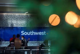 Southwest customers visit the help desk after U.S. airlines, led by Southwest, canceled thousands of flights due to a massive winter storm which swept over much of the country before and during the Christmas holiday weekend, at Dallas Love Field Airport in Dallas, Texas, U.S., December 28, 2022. 