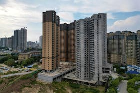 An aerial view shows unfinished residential buildings of the Gaotie Wellness City complex in Tongchuan, Shaanxi province, China September 12, 2023.