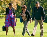 U.S. President Barack Obama (R), his wife Michelle Obama (L) and her mother Marian Robinson (C) return via helicopter from a visit at Camp David to the White House in Washington, October 9, 2011. 