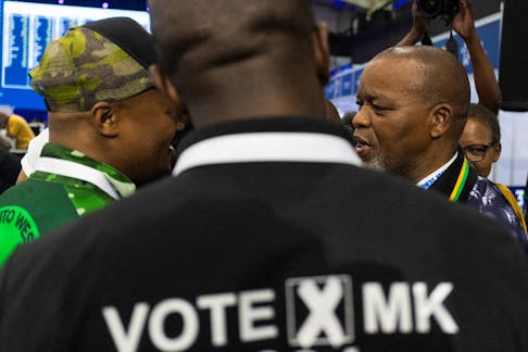 National chairperson of the African National Congress Gwede Mantashe speaks with members of uMkhonto we Sizwe (MK) party at the National Results Operation Centre of the Electoral Commission of South Africa (IEC), which serves as an operational hub where results of the national election are displayed, in Midrand, South Africa, May 31, 2024.