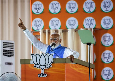 India's Prime Minister Narendra Modi gestures as he addresses  supporters during an election campaign rally, in New Delhi, India, May 22, 2024.