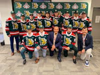 Halifax Mooseheads owners Sam Simon, front centre, and Peter Simon, front right, pose with the players the team selected at the QMJHL draft in Moncton on the weekend. - Halifax Mooseheads