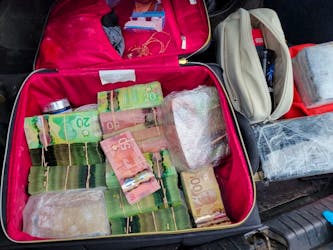 The Royal Canadian Mounted Police seized approximately eight kilograms of cocaine, more than $173,000 cash, drug paraphernalia and other items consistent with drug trafficking as part of Project Bustle. - RCMP