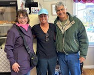 U.S. couple Rae Anne Baruffa, left, and Fran Pusateri, right are still in awe of the kindness shown to them by Louann's Café server Danielle MacKay of Sydney last month. CONTRIBUTED