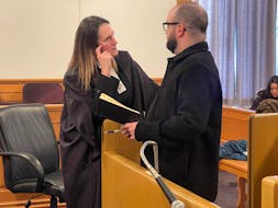 Matthew Power speaks with his lawyer, Rosellen Sullivan, in Newfoundland and Labrador Supreme Court during a recess in his trial January 22, 2024.