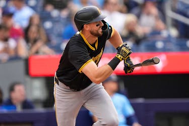 Jun 1, 2024; Toronto, Ontario, CAN;  Pittsburgh Pirates second baseman Jared Triolo (19) runs to first base on a single against the Toronto Blue Jays during the ninth inning at Rogers Centre. Mandatory Credit: John E. Sokolowski-USA TODAY Sports