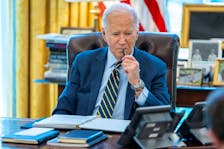 U.S. President Joe Biden speaks on the phone with Israeli Prime Minister Benjamin Netanyahu in this White House handout image taken in the Oval Office in Washington, U.S., April 4, 2024. The White House/Handout via REUTERS