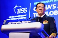Chinese Defense Minister Dong Jun speaks at the Shangri-la Dialogue in Singapore, June 2, 2024.