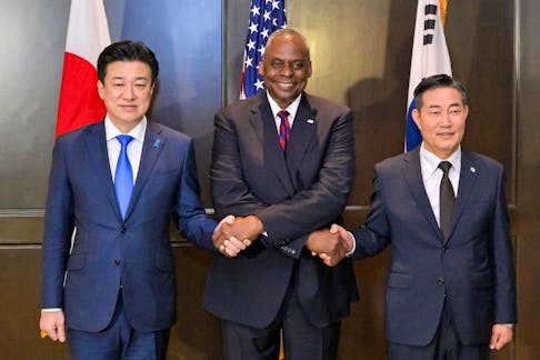 Japanese Defense Minister Minoru Kihara, U.S. Defense Secretary Lloyd Austin and South Korean Defence Minister Shin Won-sik attend a trilateral meeting on sidelines of the Shangri-la Dialogue in Singapore, June 2, 2024.