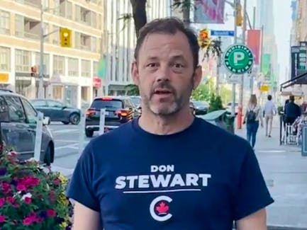 In this still image taken from a video, newly elected MP for Toronto-St. Paul's, Don Stewart, encourages residents to vote in a byelection held of June 24. 