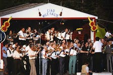 Fiddlers performing on-stage at the inaugural 1973 Glendale Fiddle Festival. Marc Gallant. Beaton Institute Archives
