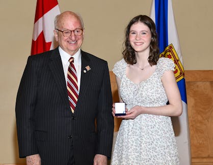 Riverview High School Grade 11 student Kylie MacDougall holds the 2024 Lieutenant Governor's Education Medal after being awarded it by the Lt.-Gov. Arthur J. LeBlanc at the ceremony in Port Hawkesbury on May 16. CONTRIBUTED/OFFICE OF THE LIEUTENANT GOVERNOR