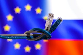LAN cables are seen in front of EU and Russian flags in this illustration taken, April 23, 2024.