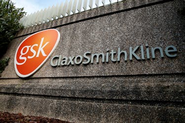 Company logo of pharmaceutical company GlaxoSmithKline is seen at their Stevenage facility, Britain October 26, 2020.