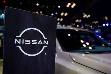 A Nissan logo is seen next to a vehicle during the New York International Auto Show, in Manhattan, New York City, U.S., April 5, 2023.