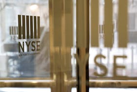 The logo of the New York Stock Exchange (NYSE) is seen on the door in New York, U.S., March 18, 2020.