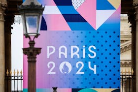 The logo of the Paris 2024 Olympic and Paralympic Games is pictured in front of the National Assembly in Paris, France, May 2, 2024.
