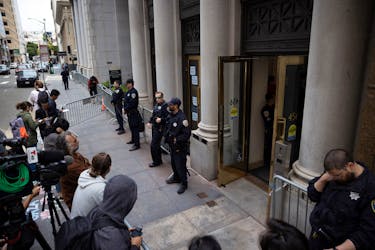 Police guard the entrance of the Israeli consulate building after pro-Palestinian protesters occupied the building lobby calling for a ceasefire in Gaza amid the ongoing conflict between Israel and Hamas, in downtown San Francisco, California, U.S., June 3, 2024.
