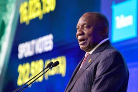 South African President Cyril Ramaphosa speaks as people attend the announcement of the election results at the National Results Operation Centre of the IEC, which serves as an operational hub where results of the national election are displayed, in Midrand, South Africa June 2, 2024.