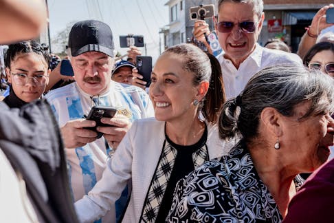 Claudia Sheinbaum, Mexico’s newly elected president, surrounded by supporters as she waits to vote in Mexico City, June 2, 2024. Sheinbaum grew up in a secular household, raised by Jewish parents who were both leftists at a time of considerable political agitation in Mexico.