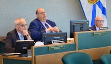 From left, UARB members Steven Murphy, vice-chair Roland Deveau and Bruce Fisher chair a public meeting over CBRM's district boundaries and number of councillors Wednesday at city hall. IAN NATHANSON/CAPE BRETON POST