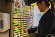 
          A customer buys a ticket for ramen at a vending machine at Goumen Maruko ramen shop in Tokyo, April 30, 2024. New yen notes set to be introduced this summer won't be compatible with many machines that businesses like ramen shops rely on. (Noriko Hayashi/The New York Times)
        