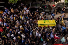 
          Mourners at a funeral in Baalbeck, Lebanon, for a member of Hezbollah who was killed in an Israeli attack on southern Lebanon, May 17, 2024. Israel and Hezbollah have their reasons for calibrating their attacks to avoid a regional conflict. (Diego Ibarra Sanchez/The New York Times)
        
