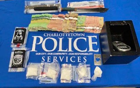Charlottetown Police Services seized 150 grams of cocaine, a machete, a collapsible baton, $5,700 cash, a cellphone, a digital scale and a vehicle during an illicit drug trade investigation on June 5. - Contributed