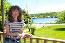 Mona Gill is the last of the Lewis descendants to live on Sunrise Drive in Westmount. She remembers as a child skating on the then-frozen over harbour. BARB SWEET/CAPE BRETON POST
