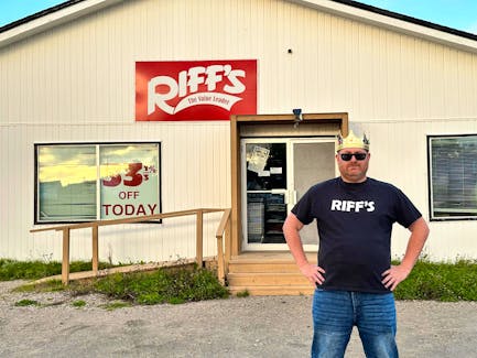 Lee Stewart stands outside the Riff's Department Store in Badger's Quay, the 18th location he visited as part of his "Riff's Quest" to visit all 20 locations in Newfoundland and Labrador. Contributed