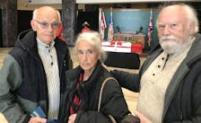 The Coultas siblings - Bud, left, Heather, and Bill – are pictured at Confederation Building in St. John's as they prepare to pay respects to the Unknown Soldier. - Contributed