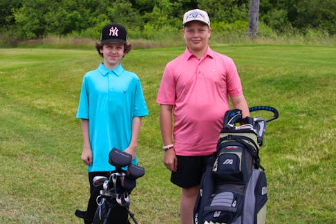 Grayson Sheaves, left, and Joshua MacDonald participated in the junior golf tournament at Passchendaele Golf Course as part of the Lambert Todd Days Festival. JAKOB POSTLEWAITE/CAPE BRETON POST
