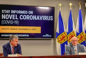 Premier Stephen McNeil and Dr. Robert Strang, Nova Scotia's chief medical officer of health, at the live COVID-19 briefing on Monday, Dec. 21. Strang said the province is expecting more Pfizer-BioNtech vaccine doses this week.