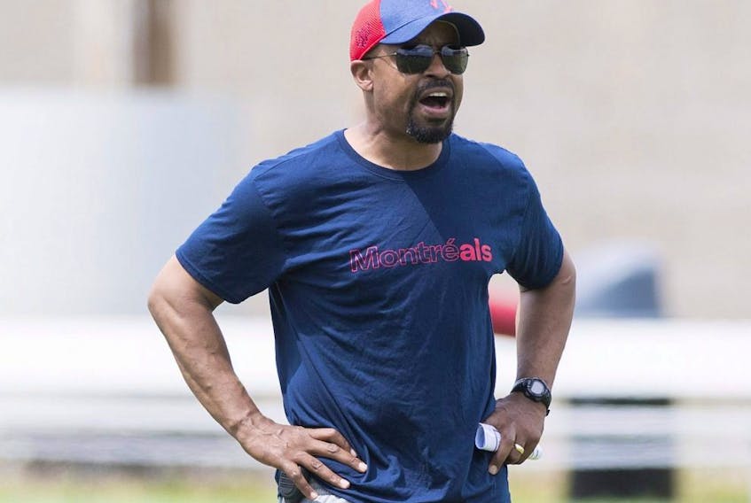 Alouettes head coach Khari Jones gives instruction to players during practice in Montreal on June 10, 2019.