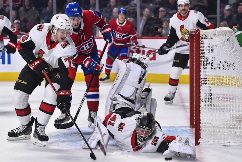 Senators goaltender Craig Anderson dives for the puck during Wednesday's game against Montreal. (GETTY IMAGES)