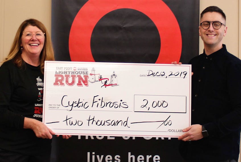 The Points East Run/Relay, heading into its fifth year, will be held on Saturday, June 13. Funds raised will go to cystic fibrosis. Shown are Sara Deveau, race director for the run, presenting a cheque for the money raised in 2019, to Tim Wakelin, the face of cystic fibrosis for 2020. Wakelin has lived with CF for 33 years and works on his health and fitness on a daily basis. Unavailable for the photo is Ray Carmichael, president of the P.E.I. chapter of CF.