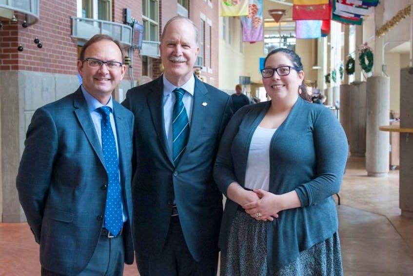 <span>Ronald MacDonald, dean of education at UPEI, left, chats with Graham Fraser, Canada’s commissioner of official languages and Brittany Jakubiec, president, Canadian Parents for French P.E.I. at the recent culture and language learning symposium at the university.</span>