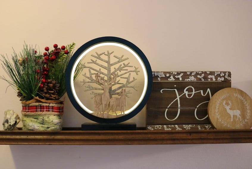 A few early touches of Christmas highlight Millicent McKay’s farmhouse Christmas theme of decorating.