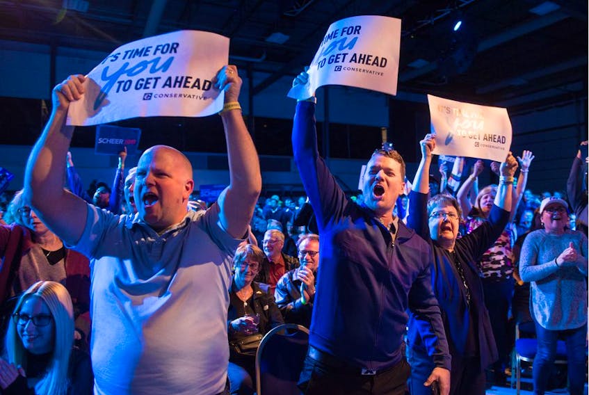 Conservative supporters cheer as it is announced that Michael Kram, the Regina-Wascana candidate won his seat over incumbent Liberal Ralph Goodale as federal election results roll in at the Conservative Party of Canada headquarters at the International Trade Centre at Evraz Place.