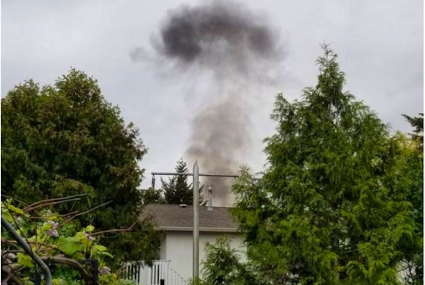 Smoke rises from a Brocklehurst neighbourhood in Kamloops where a Canadian Forces Snowbird is believed to have crashed.