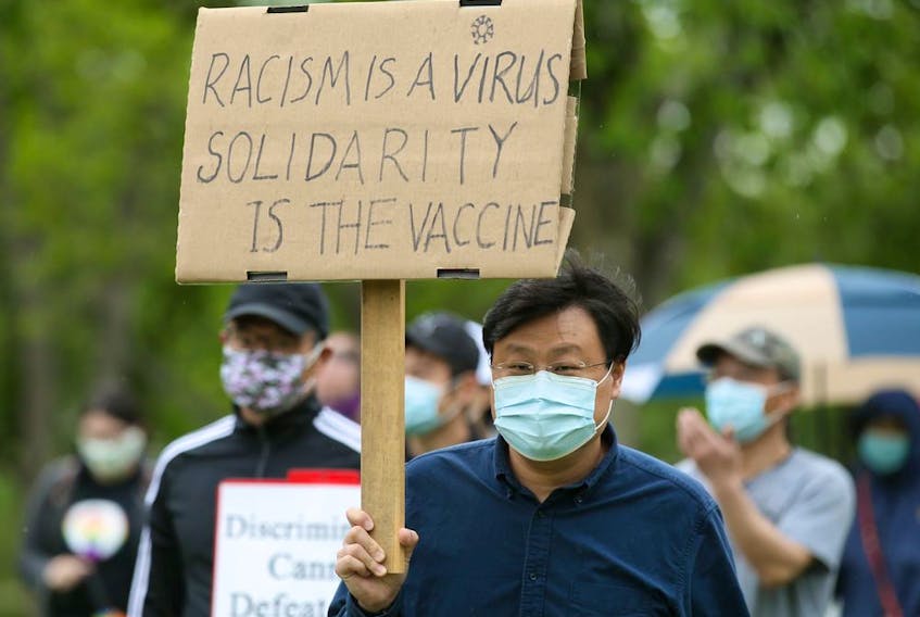 Attendees at a rally against racism towards the Chinese community during the COVID-19 pandemic. Photo taken in Saskatoon, SK on Sunday, June 14, 2020.