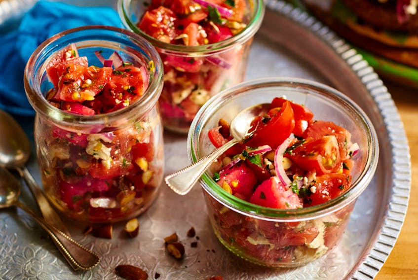 Tomato and watermelon salad makes a delicious summer side dish.