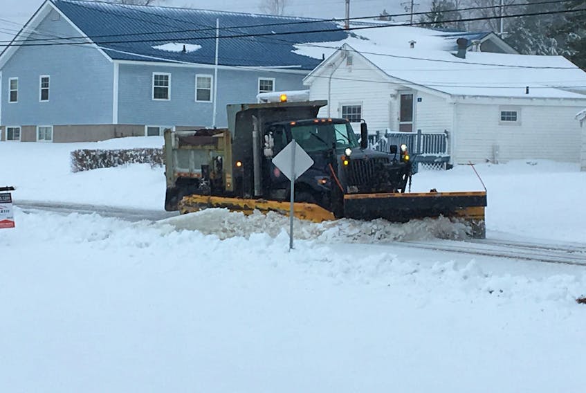 Sackville public works crews have been out in full force last night and today thanks to a storm that continues to batter the region. As of 12:40 p.m., NB Power was reporting over 8,000 customers remained without power in The Tantramar Region. Above, a plow clears Coronation Avenue in Sackville.