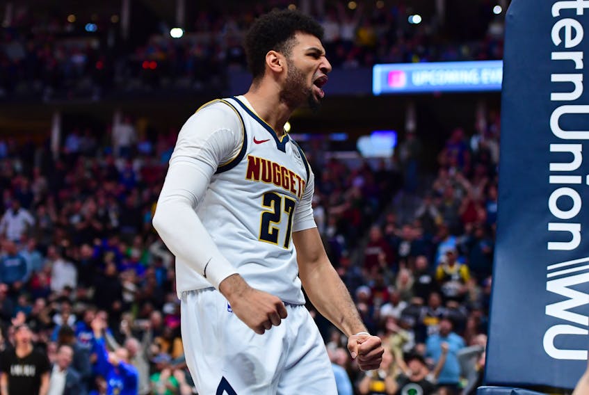 Denver Nuggets guard Jamal Murray  reacts following a basket against the Milwaukee Bucks earlier this season. (USA TODAY SPORTS)