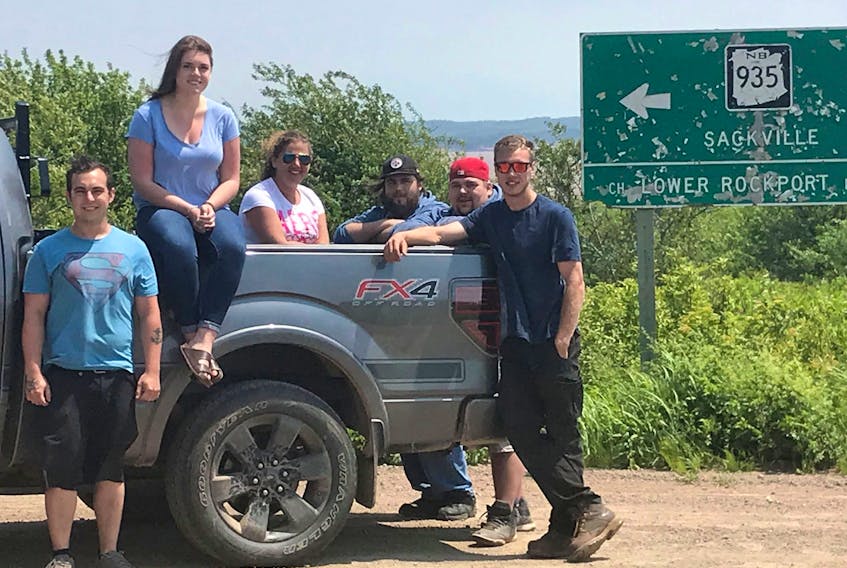 A group of friends ended up having an unexpected Canada Day experience after becoming unwitting rescuers of an elderly couple from Quebec on Sunday night. Above, in one of the pick-up trucks that the friends were driving when they found the couple in Rockport, are, left to right, Ben Rosswog, Kaitlyn Barkley, Shannon Wood, Cody Steeves, Chris Wilson and Chad Steeves.      KERRY SIMPSON PHOTO