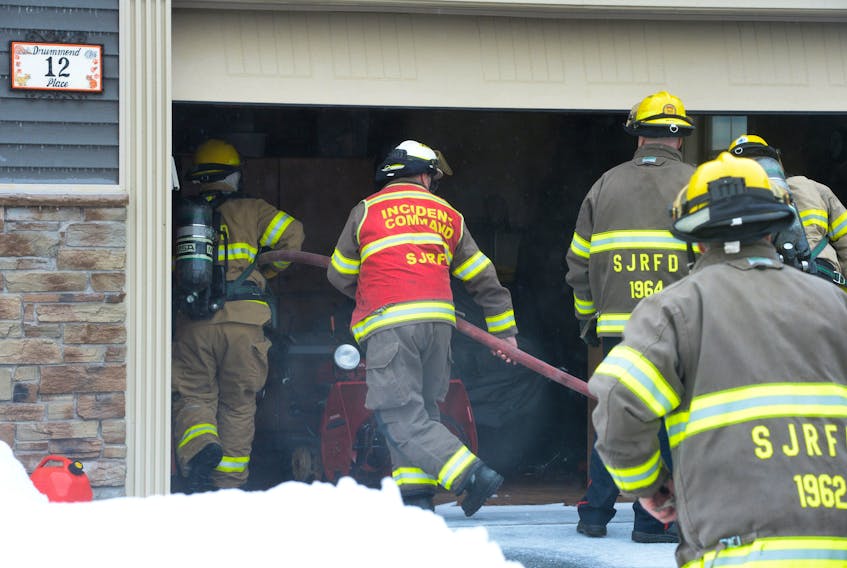 Firefighters made quick work of a garage fire in Paradise Sunday afternoon. Keith Gosse/The Telegram